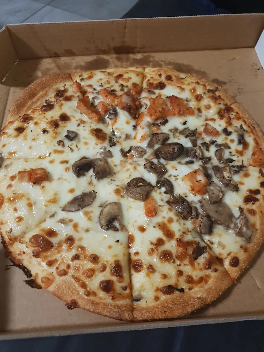 Supposedly Chicken Pizza with 11 Tiny Bits
