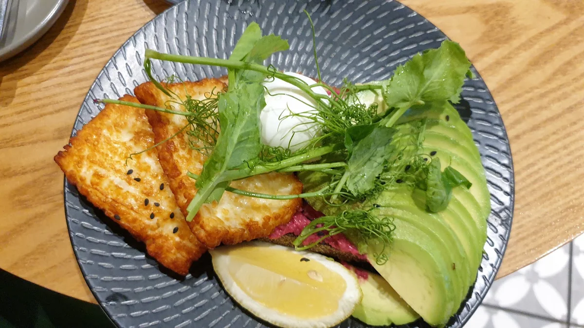 Beetroot Hummous Avocado Poached Egg Haloumi on Toast