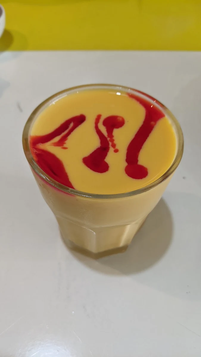 Mango Lassi, Dum Biryani at Angaara Indian Restaurant