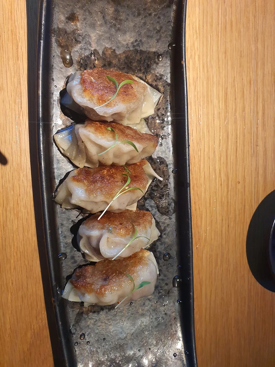 Wagyu Gyoza with Truffle Oil White Ponzu Mustard Seed