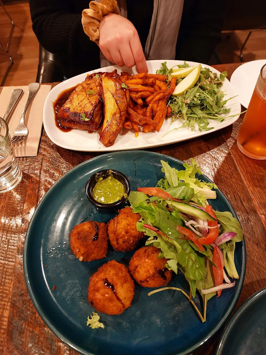 Pork Belly with Kumara Chip and Salad and Arancini Balls