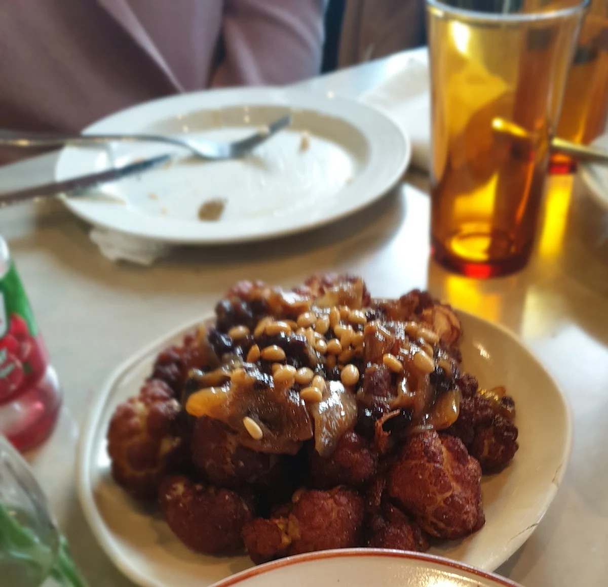 Fried Cauliflower with Caramelised Onions Currants & Pine Nuts
