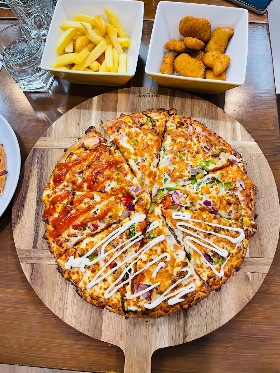 Pizzas, The Golden Goose Bar & Pizzeria