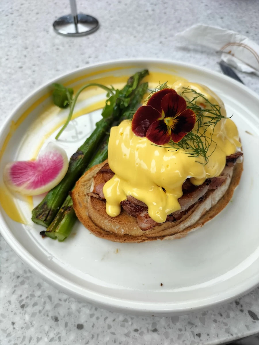 Eggs Benedict with Bacon on Sour Dough