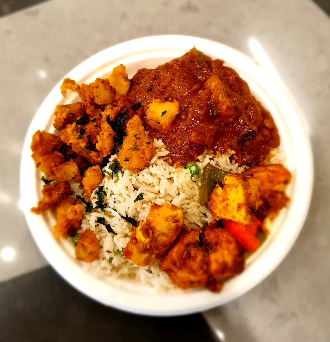 Peas Pulao with Chicken Curry Fried Potatoes and Paneer Tikka