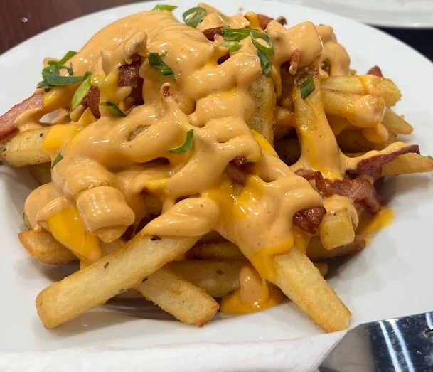 Loaded Fries with Grilled Chicken Bacon Chipotle Mayo Melted Cheese Spring Onion