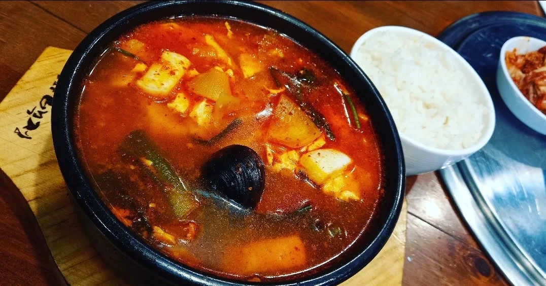 Spicy Seafood Tofu Soup Served with Rice Complimentary Kimchi