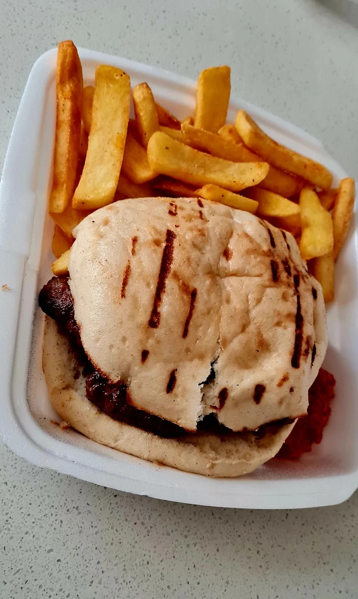 Chevapi Skinless Sausages in a Turkish Bread with Potato Chips