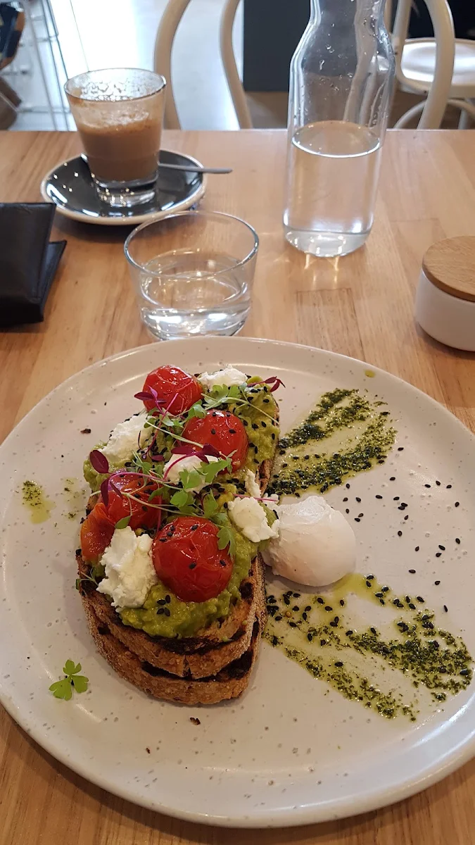 Almonds & Poached Egg on Seeded Sourdough