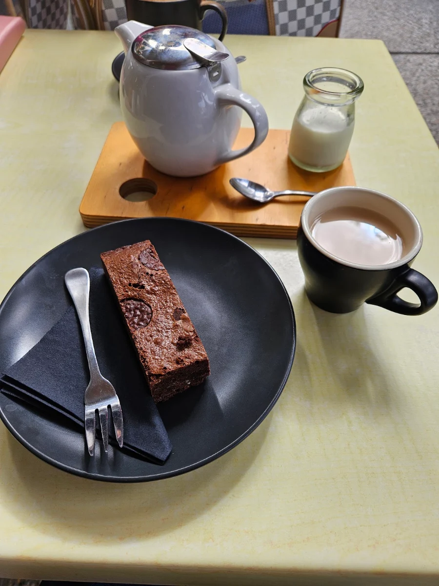 GF Chocolate Brownie with Earl Grey Tea and Full Cream Milk