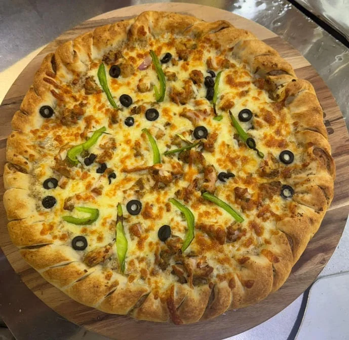 Butter chicken pizza