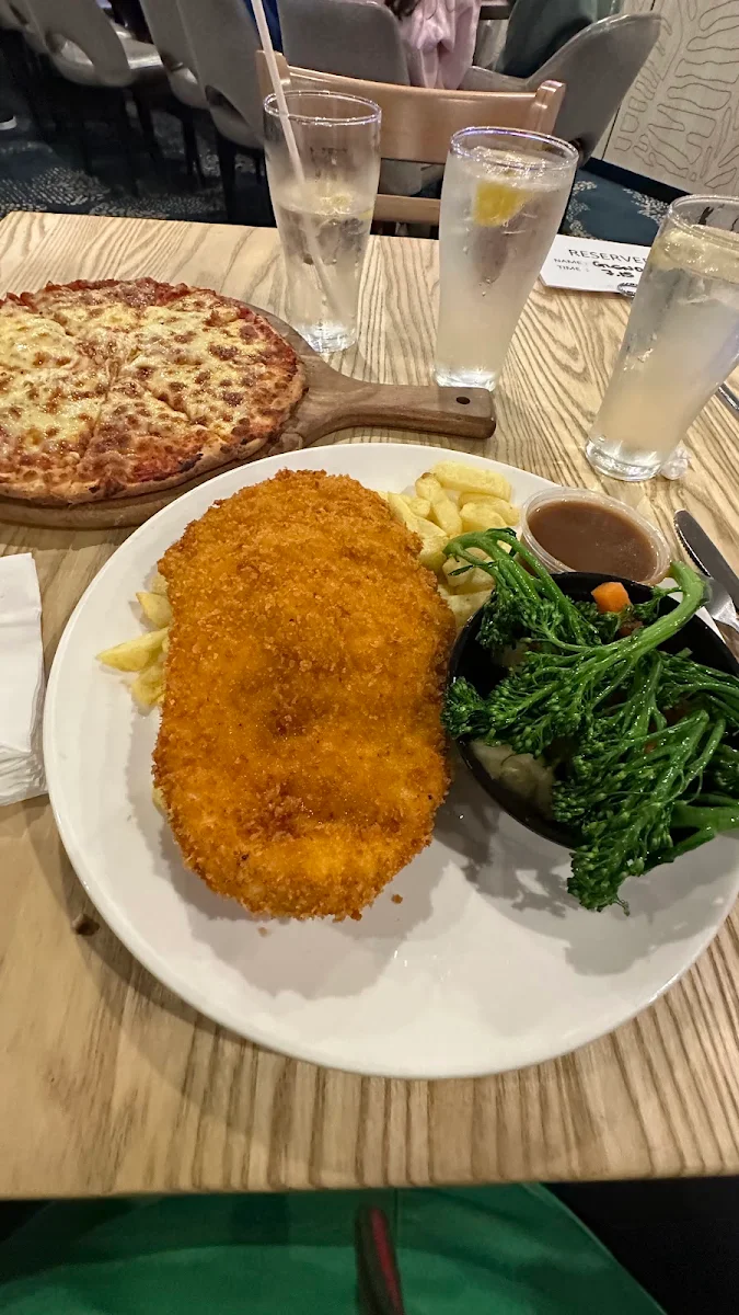 Chicken Schnitzel with Greens and Margherita Pizza Slice