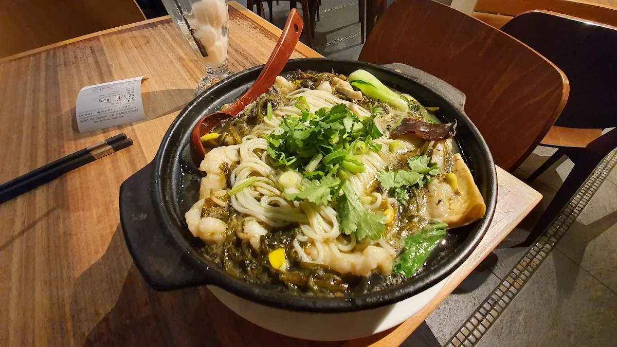 Rice Noodles with Fish Slices and Pickled Vegetables in Soup