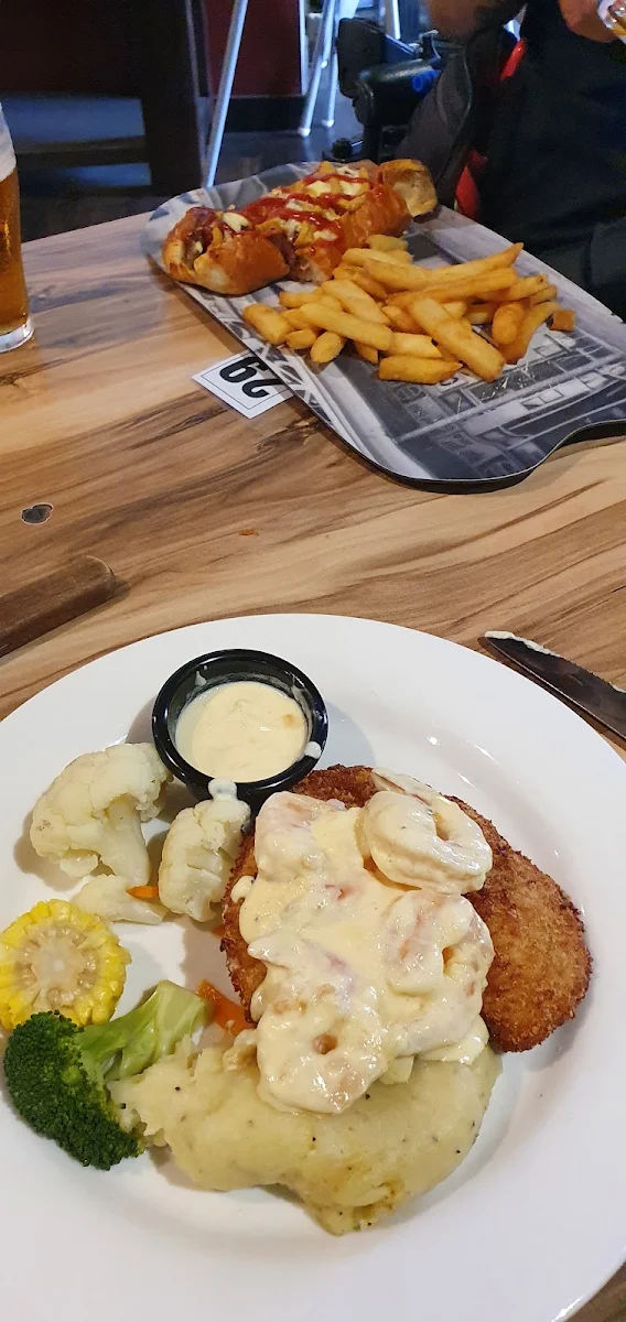Chicken Schnitzel with Garlic Prawn Topper