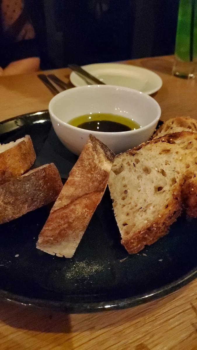 Warm Assorted Breads Italian Cold Pressed Extra Virgin Olive Oil Aged Balsamic Vinegar of Modena