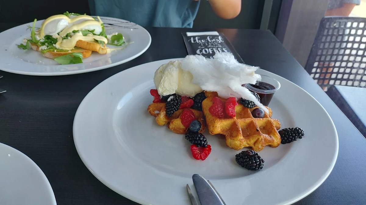 Maple Waffles with Seasonal Fruits and Maple Syrup and Chocolate Syrup