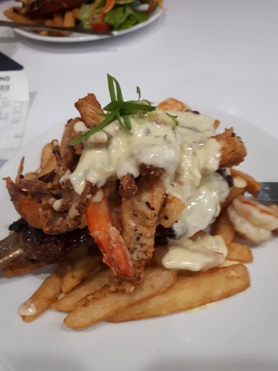 Steak with Seafood Topper the Soft Shell Crab Was Very Nice