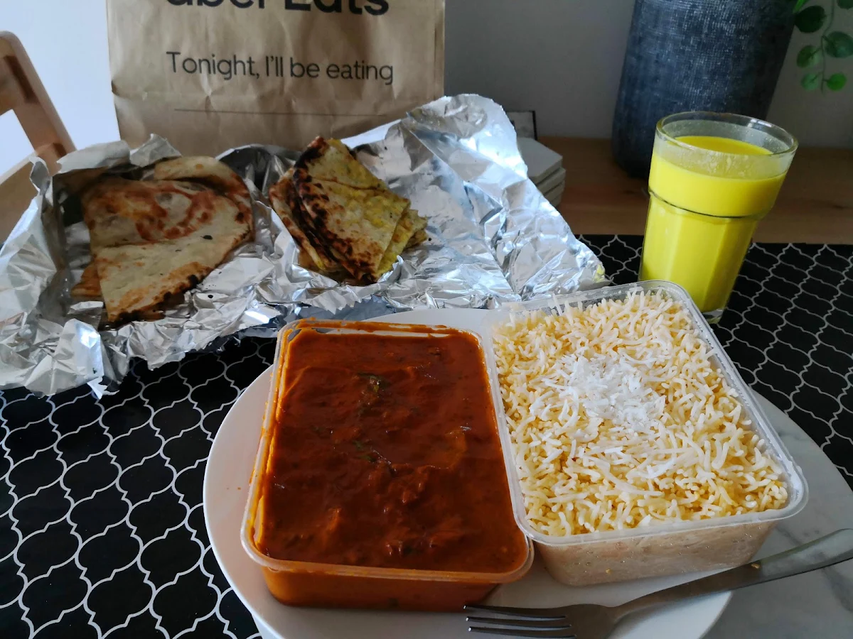 Butter Chicken w Coconut Rice Garlic Naan Cheesey Naan Mango Lassi
