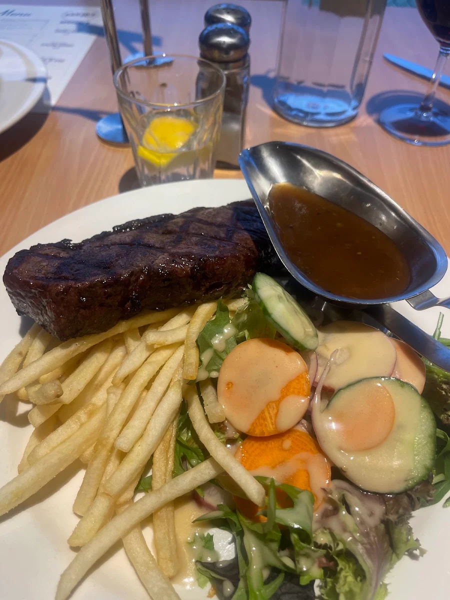 Porterhouse Steak with Fries and Salad