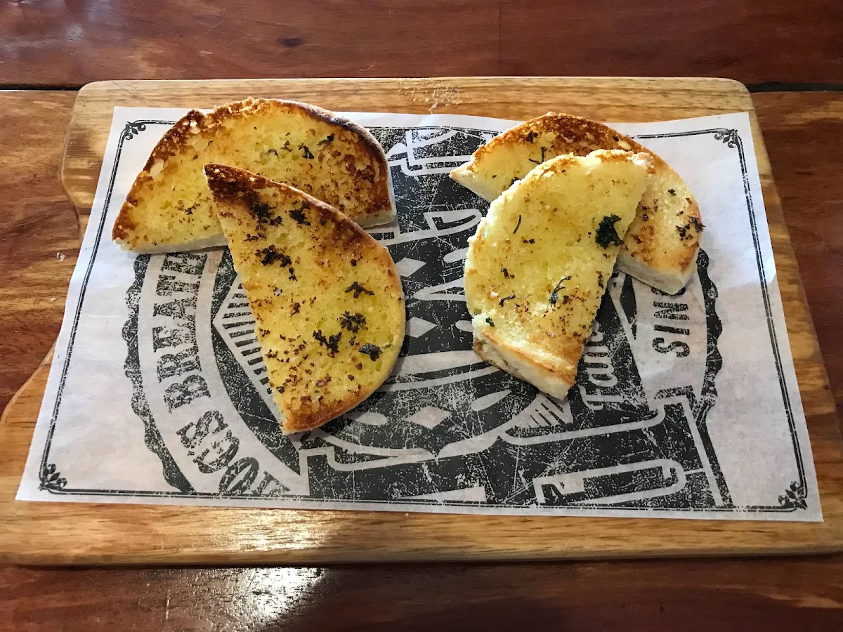 Garlic Bread, Hog's Breath Cafe Airlie Beach - The Original Hog's Breath - Ave 4.9 Stars last 23 months