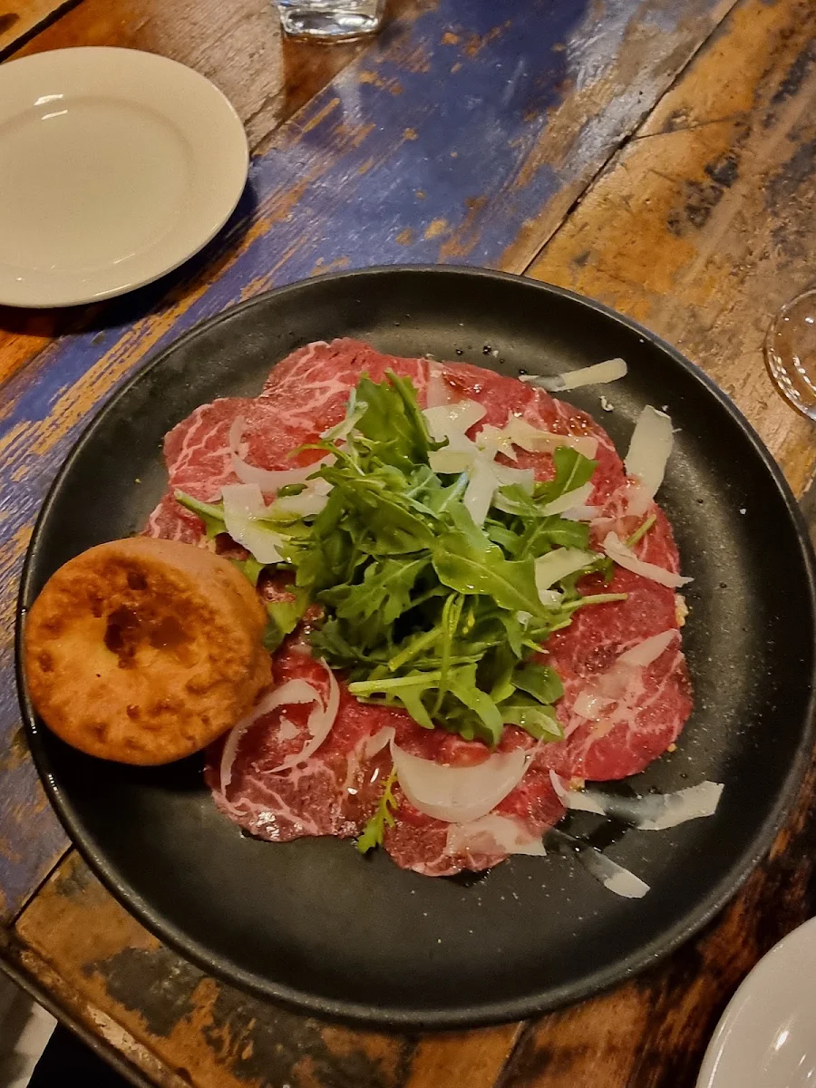Wagyu Beef Carpaccio with Yorkshire Puding Lemon & Mustard Seed Sauce
