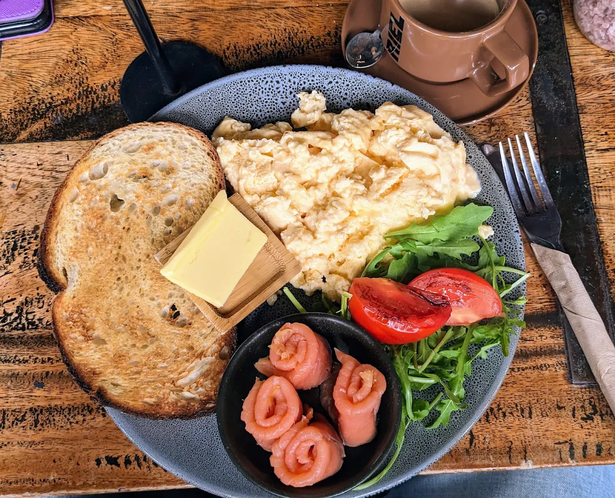 Scrambled Eggs on Toast Grilled Tomato and Smoked Salmon