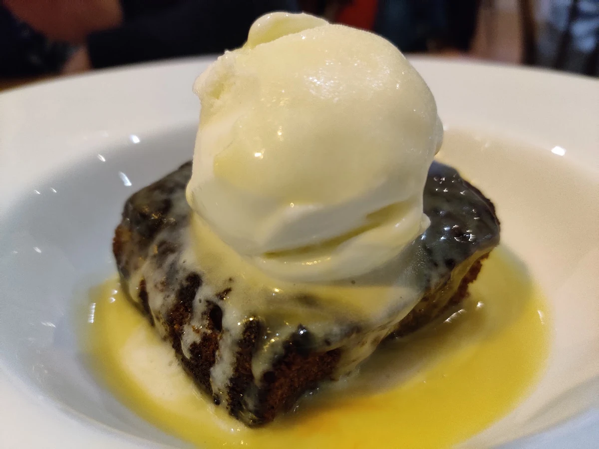 Sticky Toffee Pudding with Butterscotch Sauce and Vanilla Ice Cream