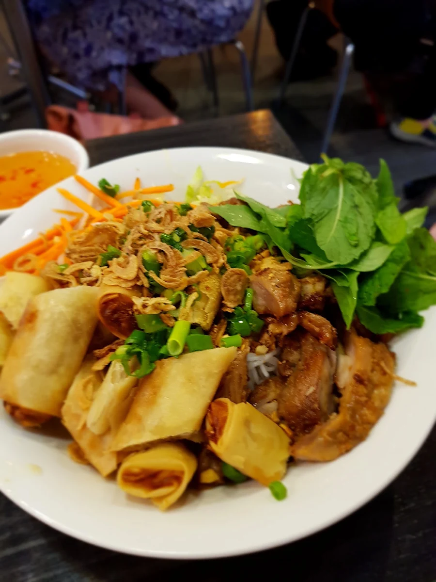 Vermicelli Noodles with Pork and Spring Rolls