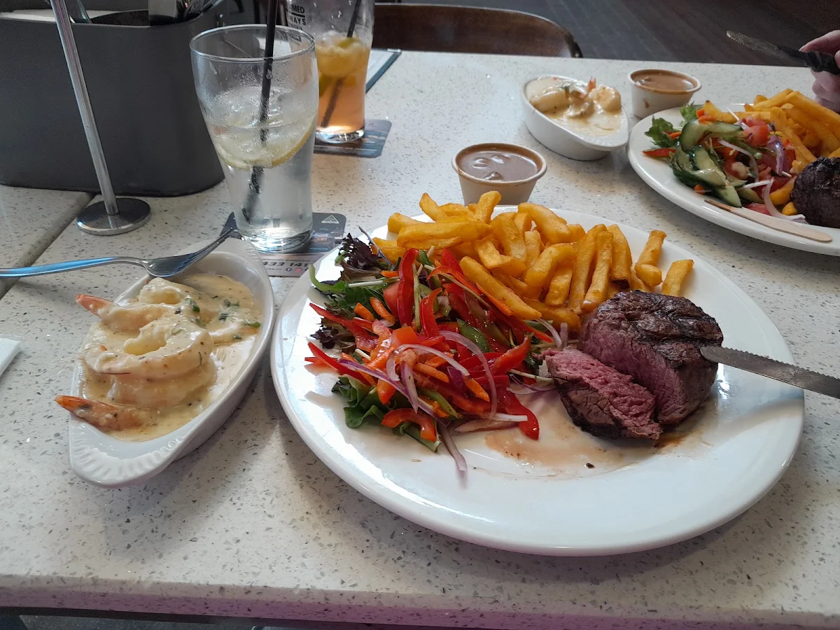 200g Eye Fillet Blue Great Salad Chips Mushroom Sauce and Garlic Prawns