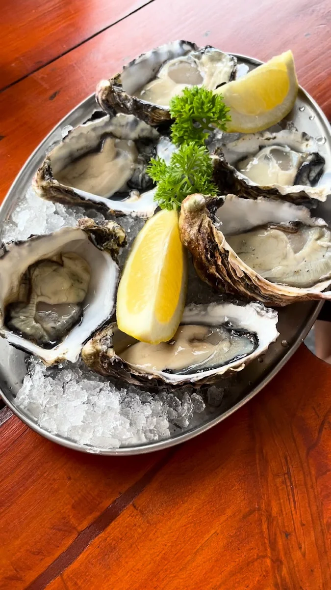 A Dozen Freshly Shucked Sydney Rock Oysters with Lemon