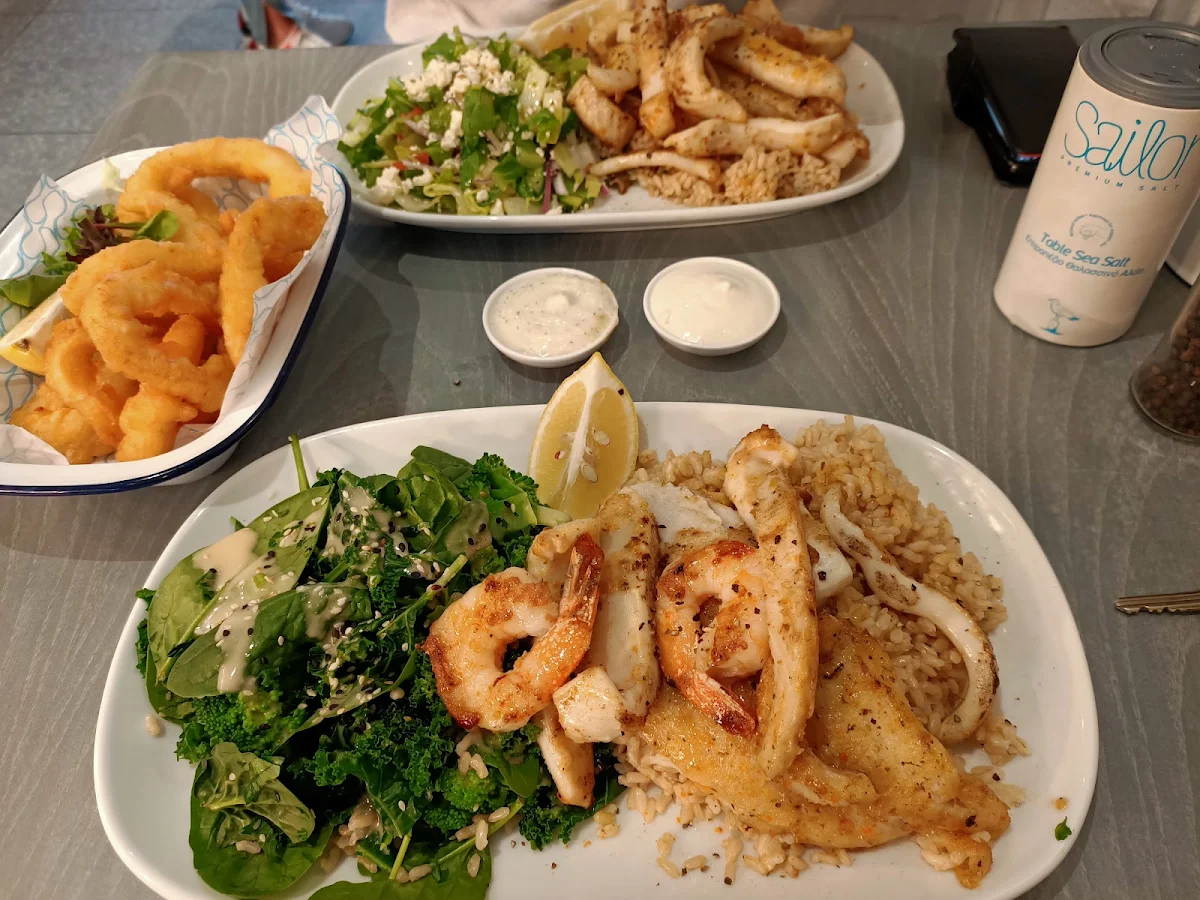 Grilled Seafood Platter with Kale Spinach and Broccoli Salad