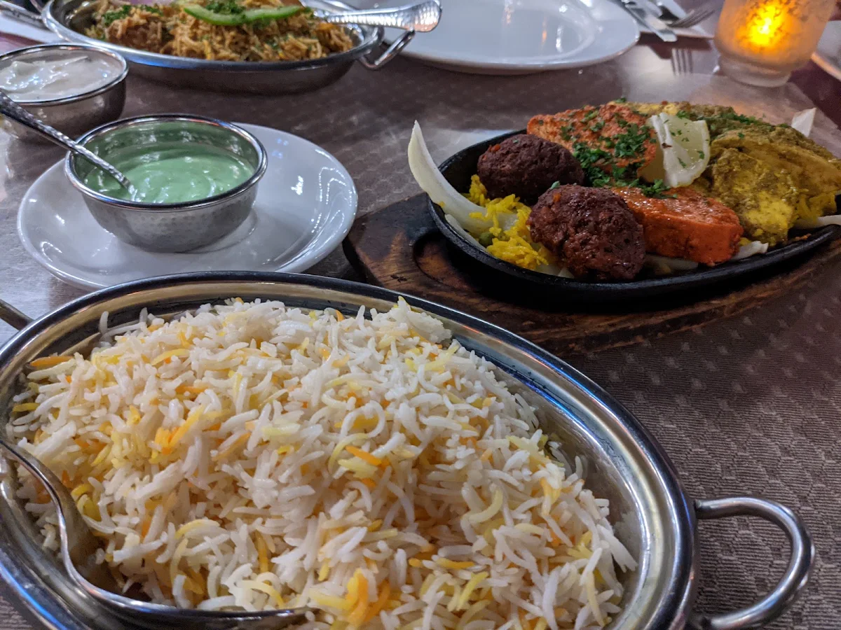 Plain Rice, A Night in India Restaurant EST 1996