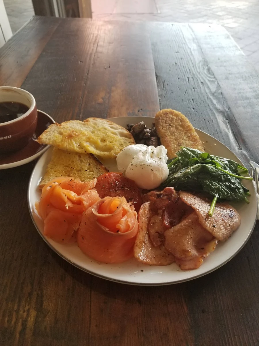 Big Breakki 2 Poached Eggs Ham Toast Smoked Salmon Spinach Grill Tomato Mushrooms and a Hashbrown