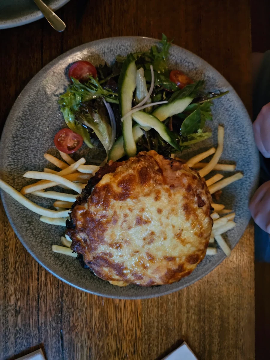 Chicken Parmigiana with Ham or Smoked Kangaroo Fries and Salad