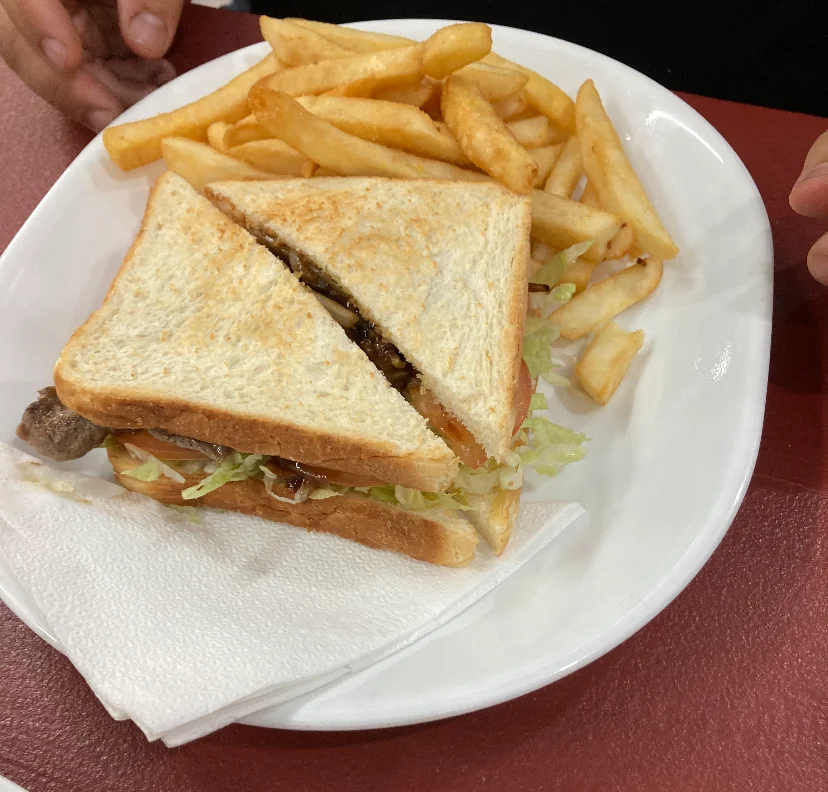 Steak Sandwich Served with Chips