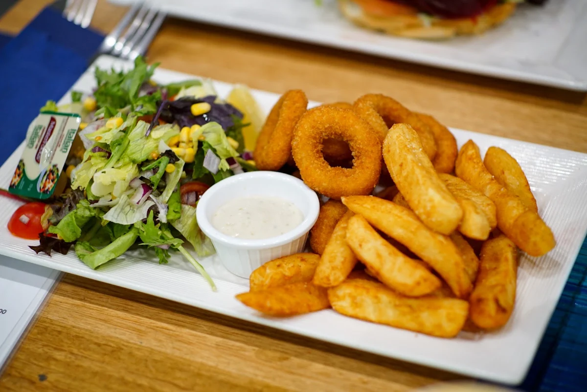 Crumbed Calamari Served with Garden Salad and Chips