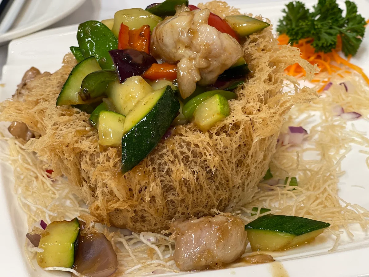 Chicken and Seasonal Vegetables on Crispy Egg Noodles