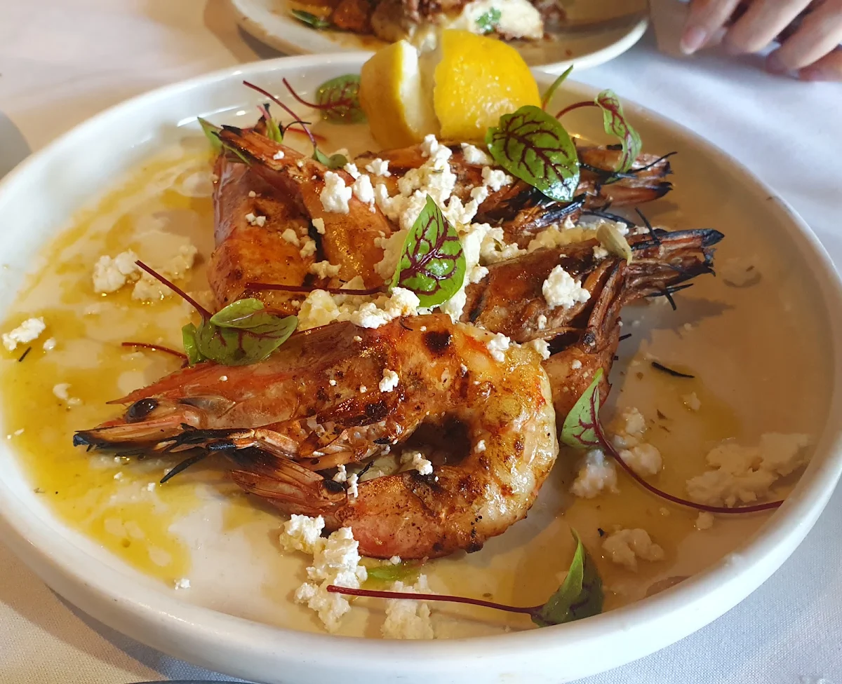 Prawns Saganaki’ Sizzling Hot Pot of Prawns Feta Parsley Tomato Sugo