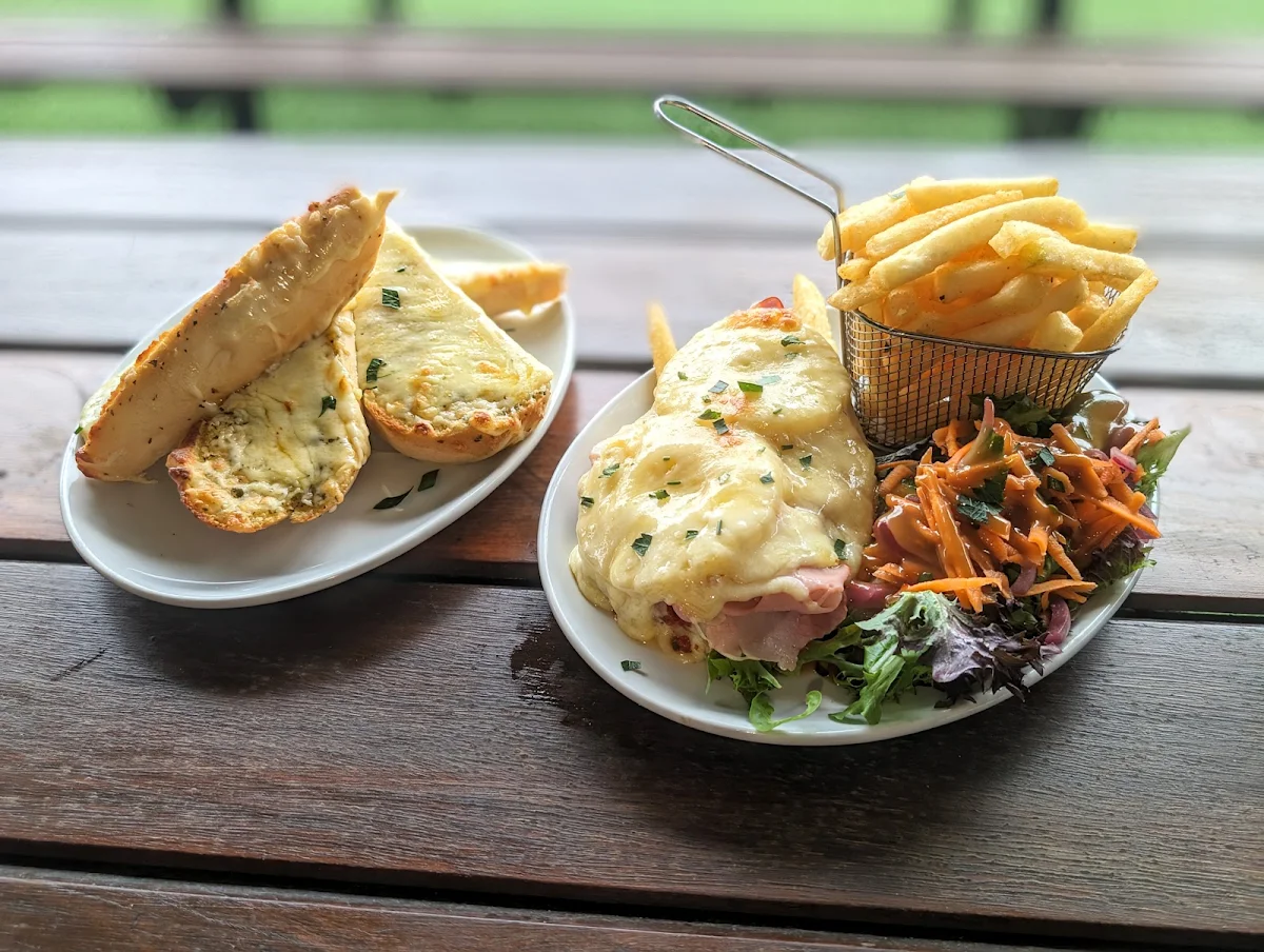Half Serve Chicken Parma Tropical with Cheesy Garlic Bread