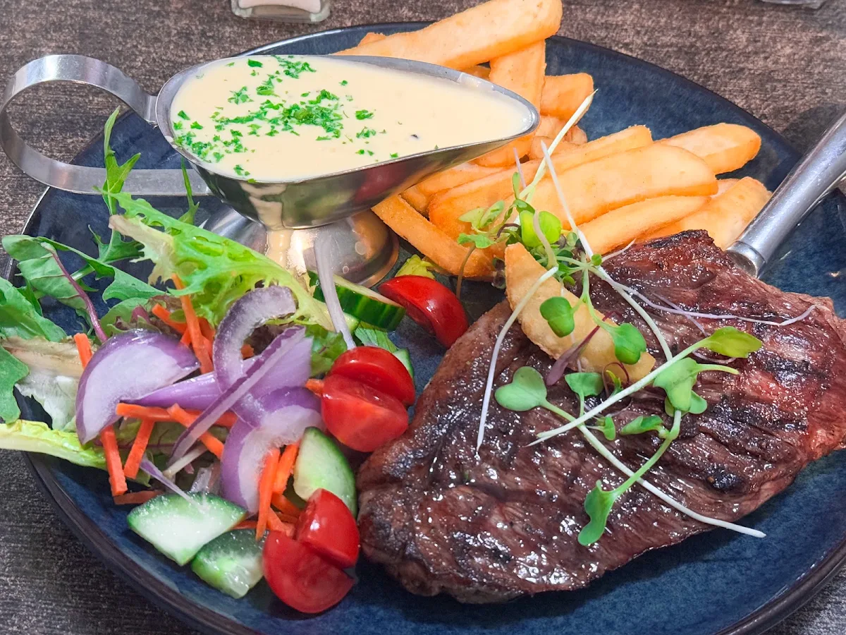 Porterhouse Steak with Creamy Garlic Sauce