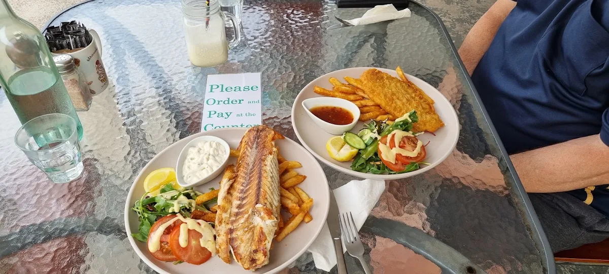Grilled Barramundi with Salad and Chips Fried Barramundi with Salad and Chips