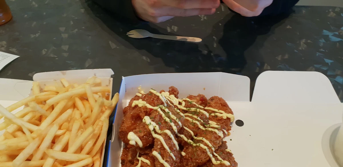 Chicken Wings in a Secret Sauce Chips and Sticky Rice