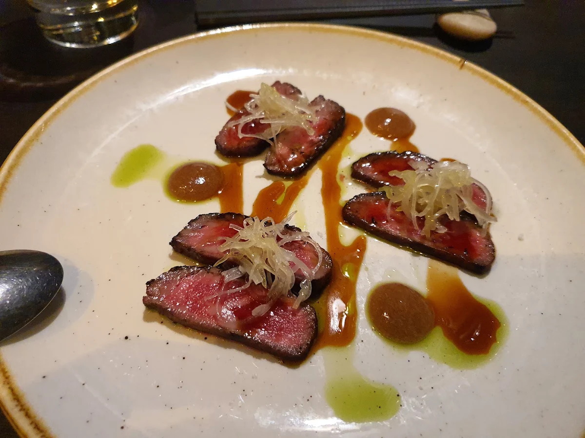Wagyu Beef Tataki mb8 Sichuan Green Pepper Infused Leek Burnt Soy