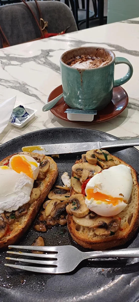 Poached Eggs on Toast with Mushrooms and Chili