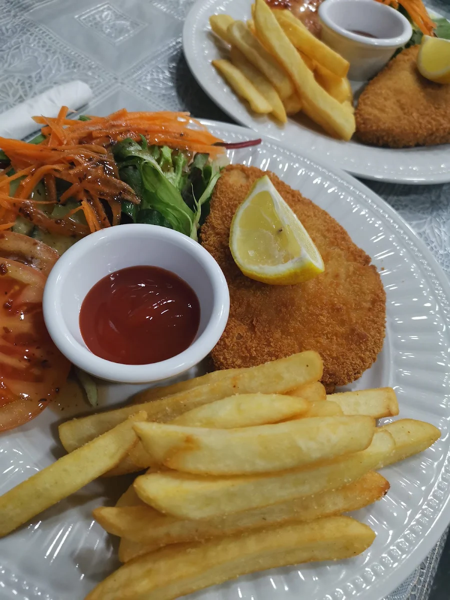 v2 Plant Based Schnitzel with Salad and Chips Looks Nice Tastes Great