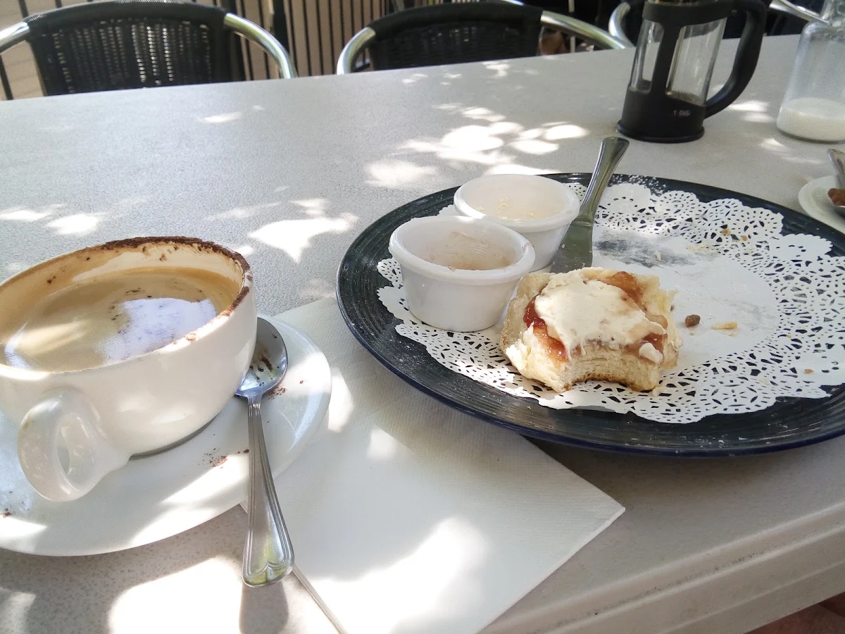 Scones with Jam and Cream and Cappuccino