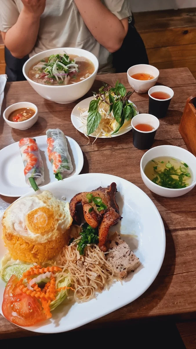 Broken Rice Combination with Pork Chops Shredded Pork Skin Steamed Vietnamese Egg Meatloaf and Egg