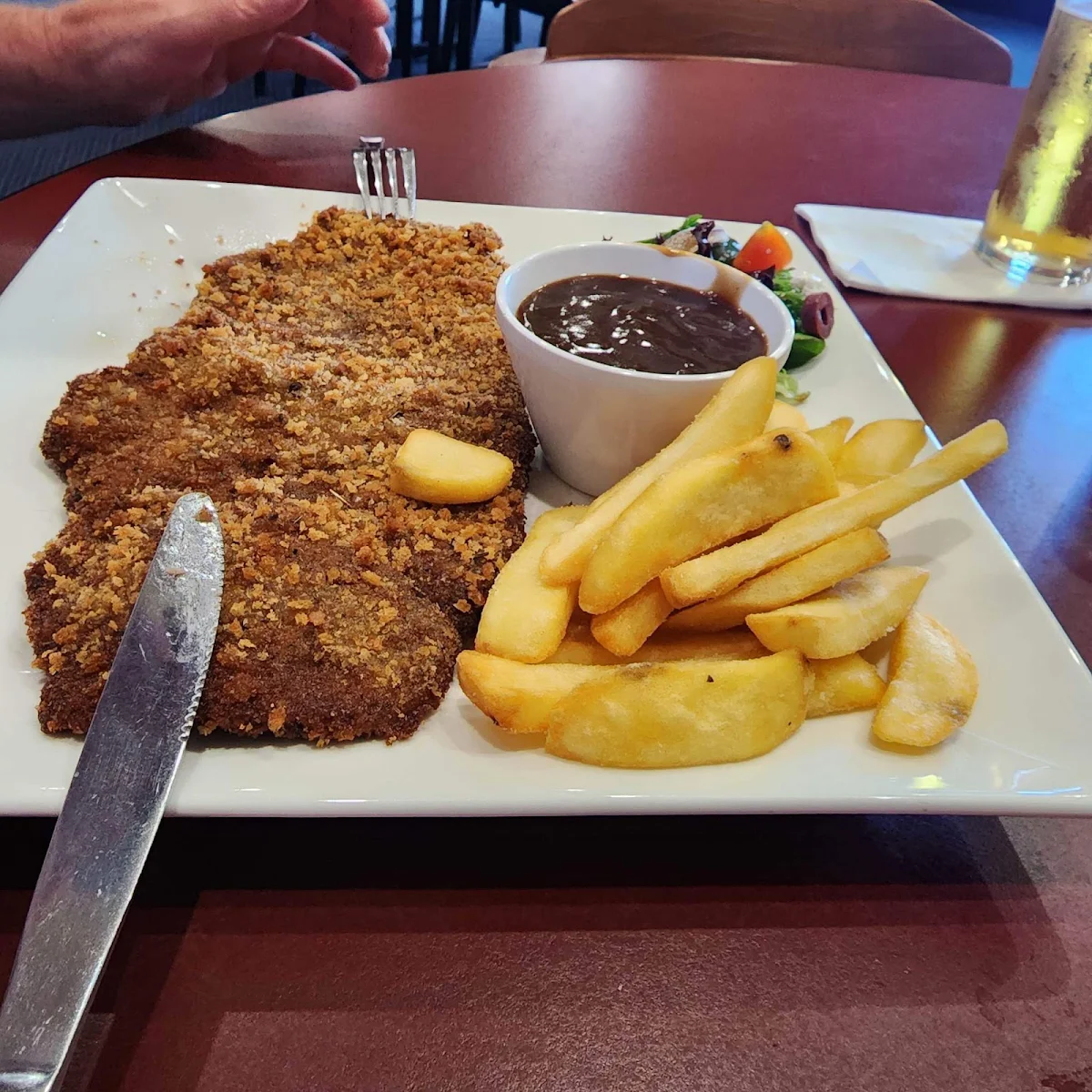 Beef Schnitzel Italian Salad and Chips