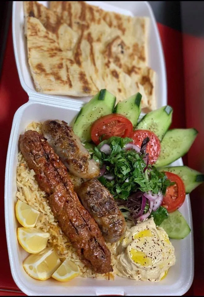 Adana Kebab Seftalia Kebab Salad Rice Hummus Dip and Bread