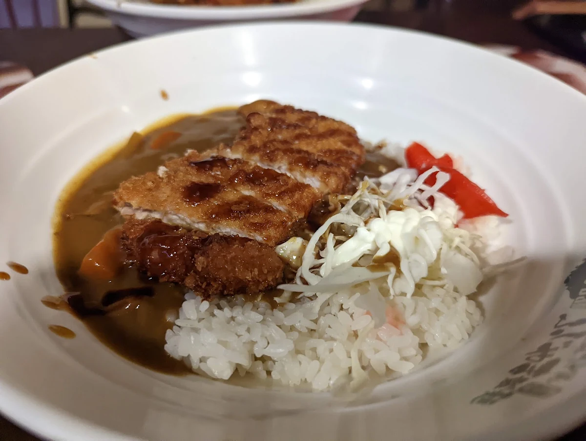 Fujiyama Curry with Deep-Fried Chicken Pawn Fish and Soft Boiled Egg